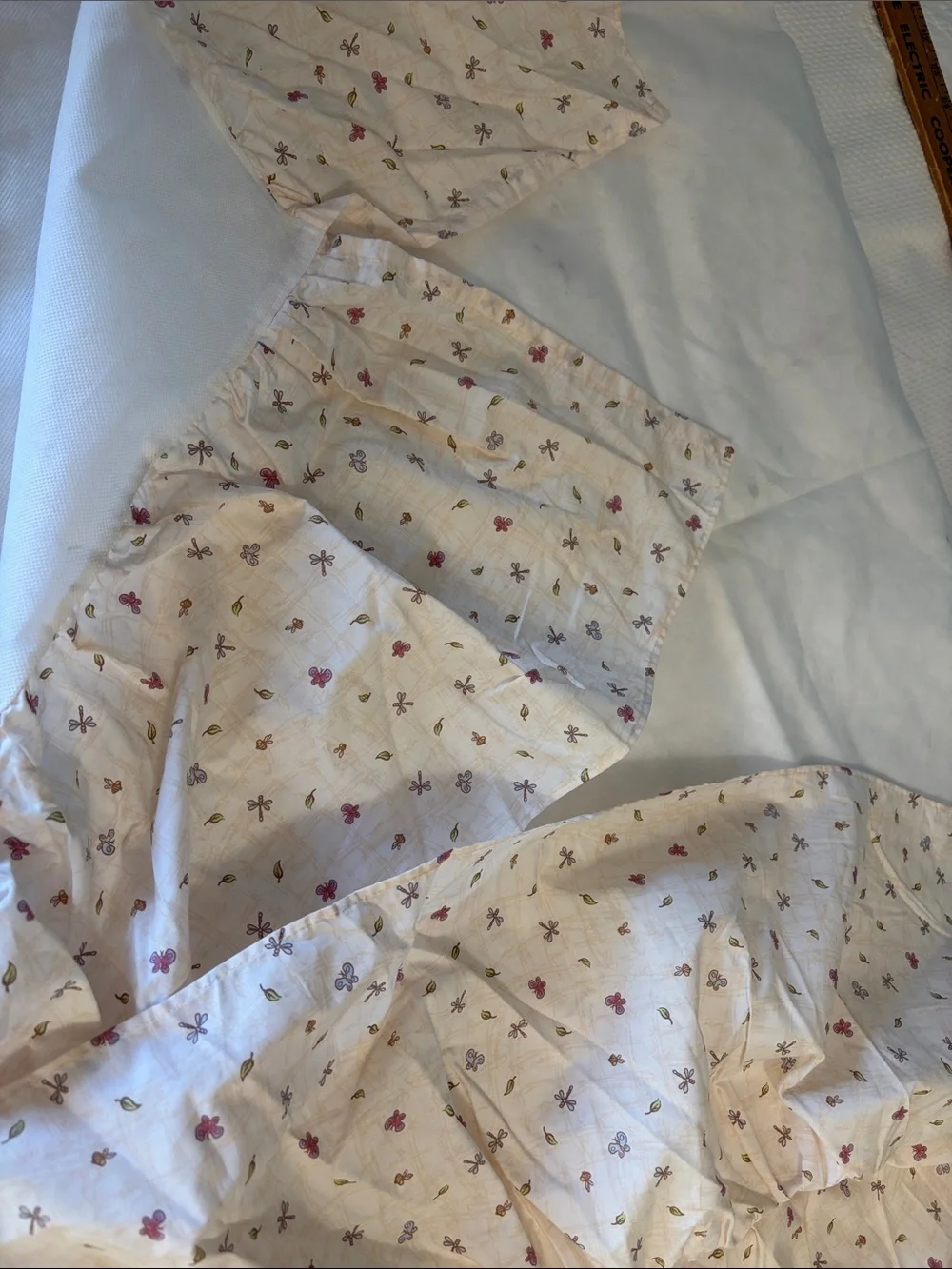 Set of Pooh bedding, crib sheet and dust ruffle